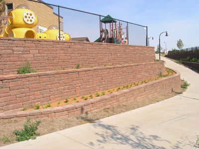 Fall protection safeguards the day care center above and provides a safe way to cross the busy highway.